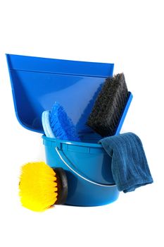 Yellow brush for cleaning of premises complete with a dark blue set: a bucket, a scoop, a brush and a rag.