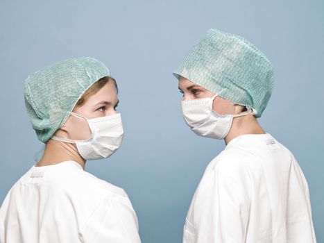 Two nurses with sugical masks