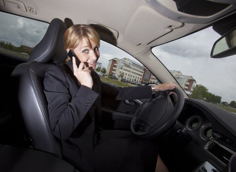 Woman on the phone when she driving her car