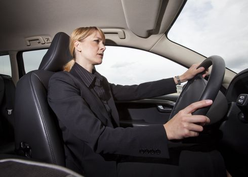 Woman driving her car