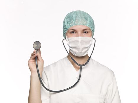 Female nurse with a stethoscope isolated towards white background