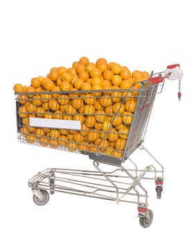 Shopping cart with oranges isolated towards white background