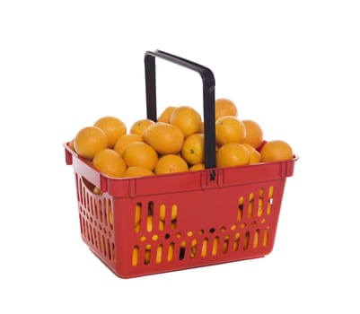 Shopping basket with oranges isolated towards white background