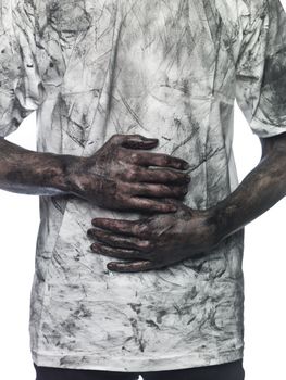 Dirty hands in front of a dirty shirt