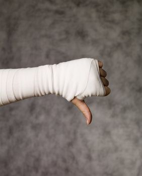Thumbs down from injured hand