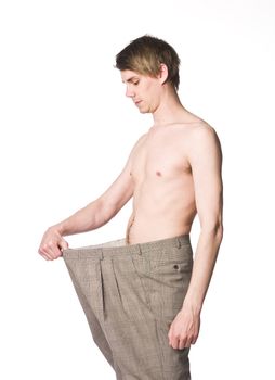 Man with oversized trousers