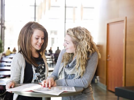 two girls studying