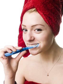 girl brushing her teeth