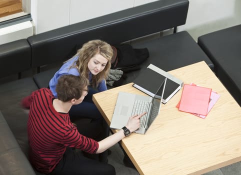 Couple in front of a computer