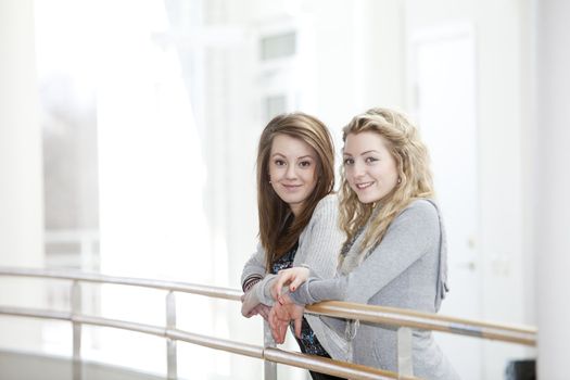 two girls smiling