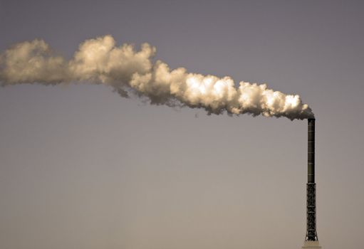 A photography of a dirty smoke stack