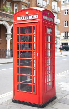 A photography of a red phone box in London UK