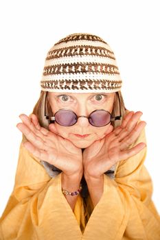 Crazy new age woman in a yellow robe framing her face