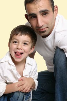 Casual portrait of a father with joyful son