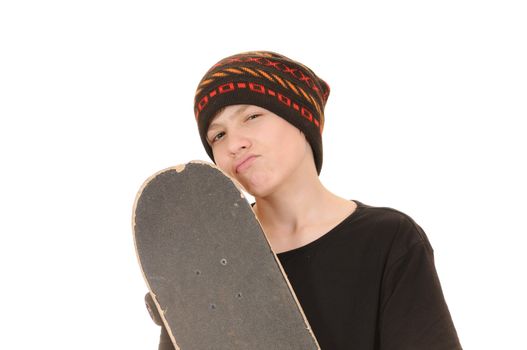 The teenager with a skateboard and in a hat isolated on white background