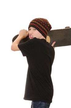 The teenager with a skateboard and in a hat isolated on white background