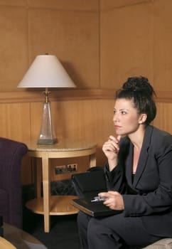 Businesswoman in a waiting area