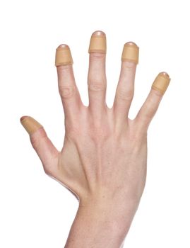 Hand with bandaid isolated on a w hite background