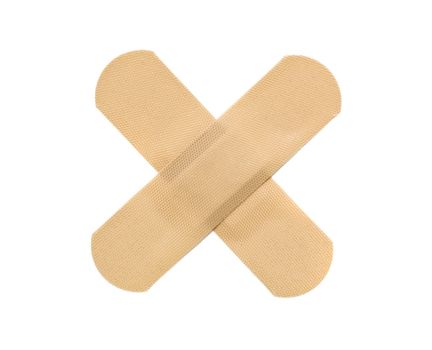 Beige bandaid isolated on a white background