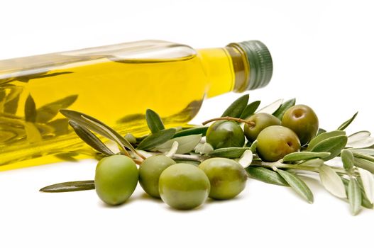 olive oil and oilves on white background