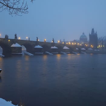 Charles bridge during night in winter, Prague, Czech Republic