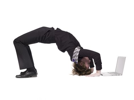 Acrobatic man with a computer
