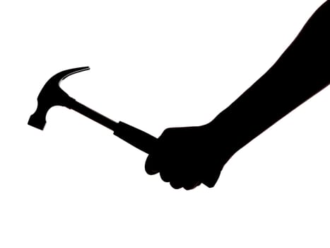 silhouette of a hand holding a hammer