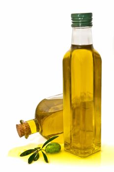 olive oil and olives on white background