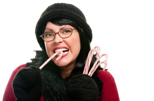 Pretty Woman Holding Candy Canes Isolated on a White Background.