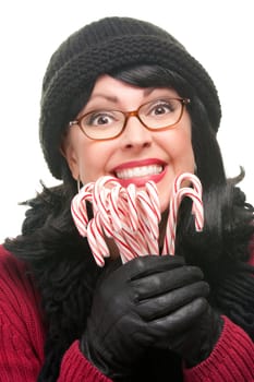 Pretty Woman Holding Candy Canes Isolated on a White Background.