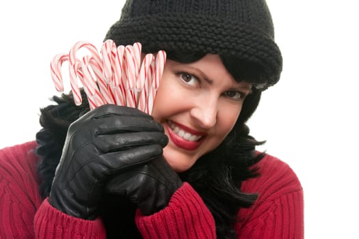 Pretty Woman Holding Candy Canes Isolated on a White Background.