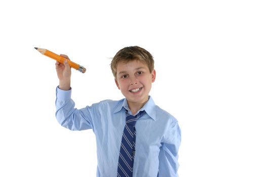 Happy schoolboy holding a pencil in a writing position