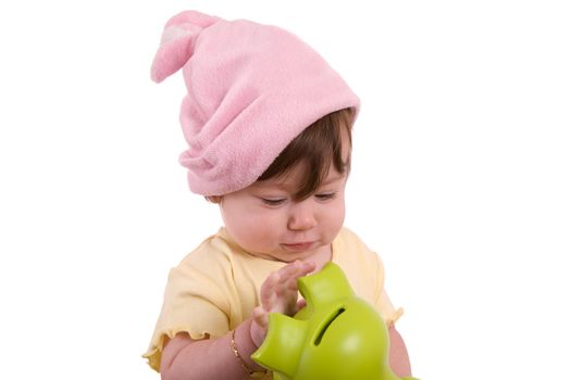 Sweet little baby playing with her toy