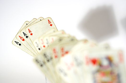 playing cards of four aces