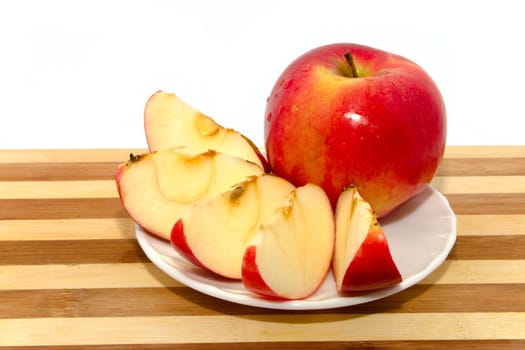 Red apple on chopping board