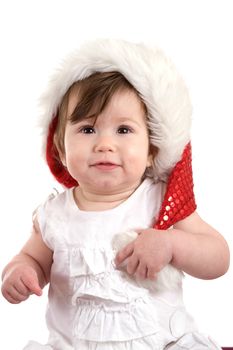 Cute baby celebrating her very first christmas