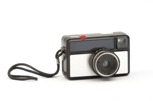 Old camera over white background