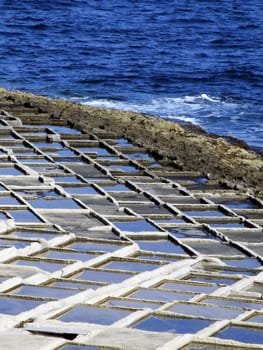 Saltpans on the island of Malta, found in various localities on rocky shores. Left over from the Roman Empire era.