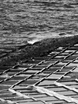 Saltpans on the island of Malta, found in various localities on rocky shores. Left over from the Roman Empire era.