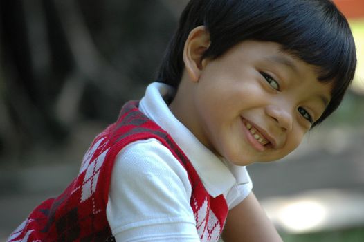 little boy with nice and cute face expression