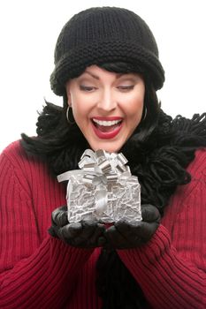 Happy, Attractive Woman Holds Holiday Gift Isolated on a White Background.