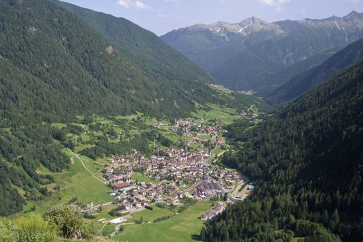 aerial view of Pejo valley in summer ,Trentino, Italy with the characteristic small town of Cogolo. Photo taken with polarized filter