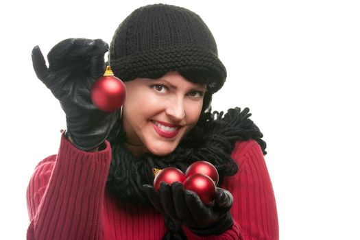 Attractive Woman Holding Christmas Ornaments Isolated on a White Background. 