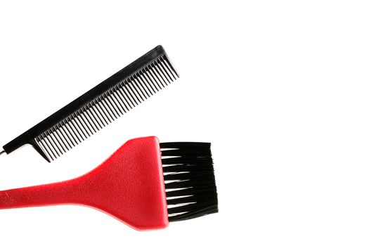 Hairbrush and brush for painting of hair in salon and a hairdressing salon.