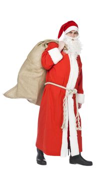 Santa claus with a sack of gifts isolated on white