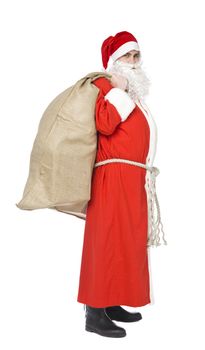 Santa claus with a sack of gifts isolated on white