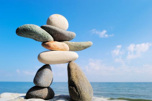 Figurine from gravel on the sea coast
