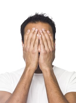 Portrait of a man covering his face isolated on a white background