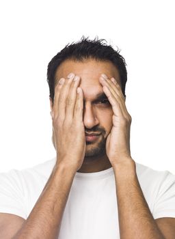 Portrait of a man hiding in his hand isolated on a white background