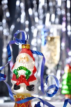santa claus toy glass on beautiful bokeh background